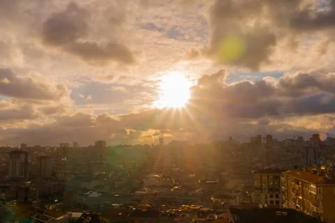 Dramatic sunset sky with the setting sun over the city, Istanbul Stock Photos