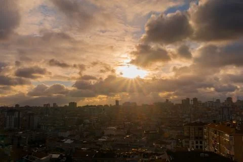 Dramatic sunset sky with the setting sun over the city, Istanbul Photos