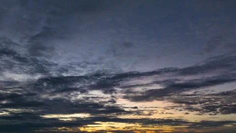 Dramatic Sunset Sky With Shifting Clouds And Vibrant Twilight Colors Over T.. Stock Footage 340016519