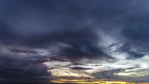 Dramatic sunset in the Sky through cumulus storm clouds Stock Footage 171494632