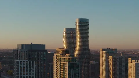 Dramatic Sunset Skyline of Mississauga's Iconic Absolute Towers Stock Footage 327541211