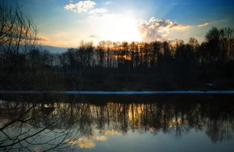 Dramatic sunset on spring river background Foto stock