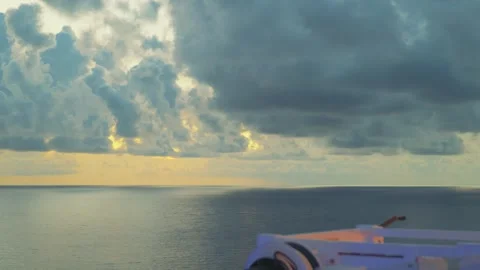 Dramatic Sunset Storm Clouds Over Open Ocean Horizon from Ship Deck Stock-Footage 346940257