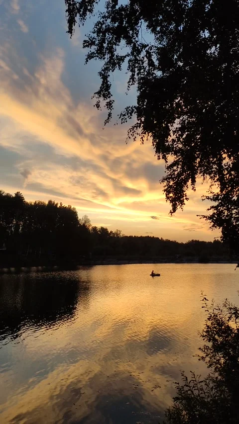 Dramatic Sunset on a Summer Lake. Stock Footage 314607333