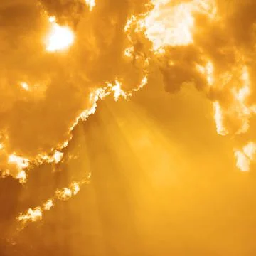 Dramatic Sunset with sun rays through clouds Foto stock
