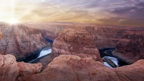 Dramatic sunset with sunrays in horseshoe bend Stock Photos