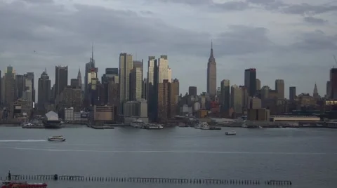 Dramatic Sunset Time-Lapse of Midtown Manhattan with Clouds Passing Stock Footage 62528903