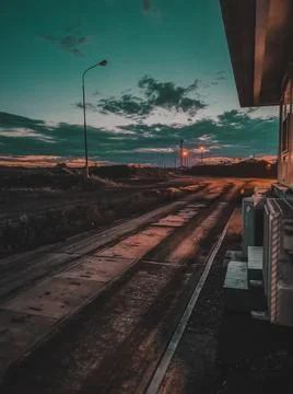 Dramatic sunset on an urban road Stock Photos