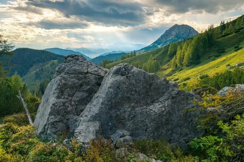 Dramatic sunset in the vast Alpine valley under the Hoher Dachstein massif on a Stock Photos