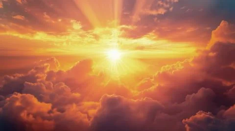 Dramatic sunset with vibrant clouds and sun rays illuminating the sky Stock Photos