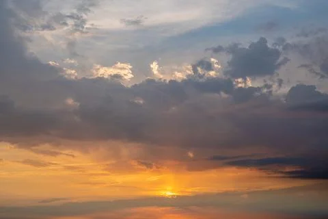Dramatic Sunset with Vibrant Clouds Stock Photos