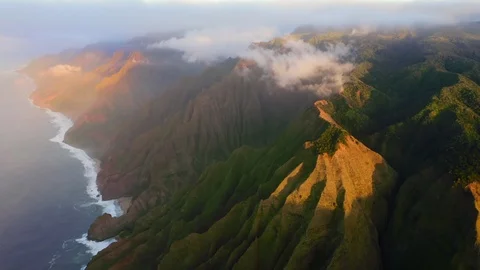 Dramatic sunset view of Hawaiian coastline and Pacific ocean. Impressive aerial Stockbeeldmateriaal 122460244