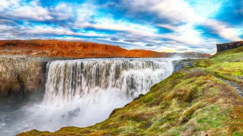 Dramatic sunset view  of the most powerful waterfall in Europe called Dettifo Stock Photos