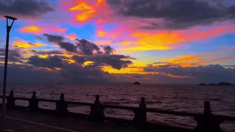 Dramatic Sunset From Waterfront Promenade Stock-Footage 334443084