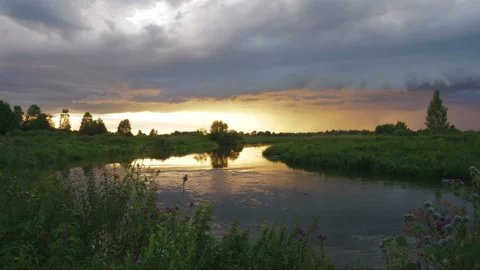 Dramatic sunset on a wild river. Time lapse Stock Footage 138197666