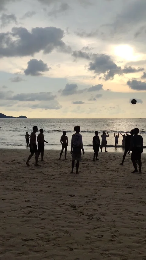 Dramatic sunsets and few tourists on the beach. Stock Footage 309436982