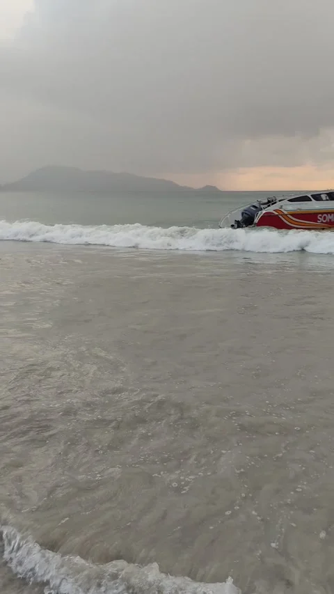 Dramatic sunsets and few tourists on the beach. Stock Footage 309437004