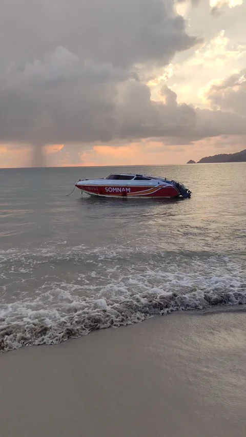 Dramatic sunsets and few tourists on the beach. Stock Footage 309437060