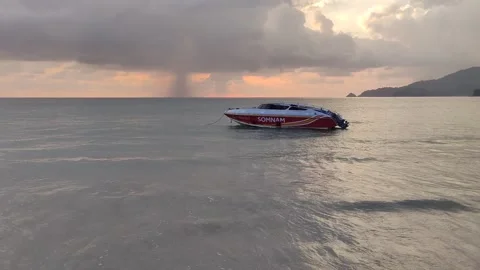 Dramatic sunsets and few tourists on the beach. Stock Footage 309437076