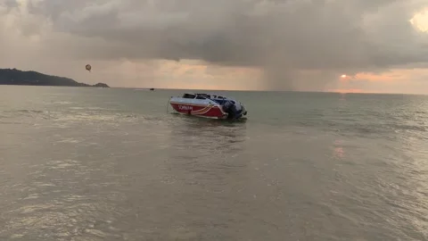 Dramatic sunsets and few tourists on the beach. Stock Footage 309437121