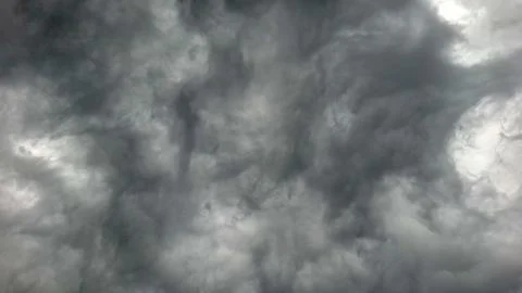 Dramatic Swirling Dark Storm Clouds in the Sky 스톡 사진
