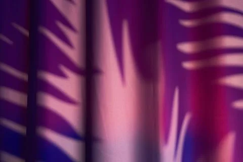 Dramatic theater stage backdrop. Vivid red and purple velvet curtain with m.. Stock Photos