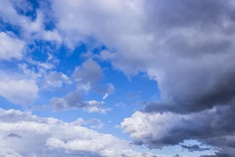 Dramatic thunderstorm clouds background at blue sky Stock Photos