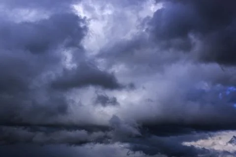 Dramatic thunderstorm clouds background at dark sky Stock Photos