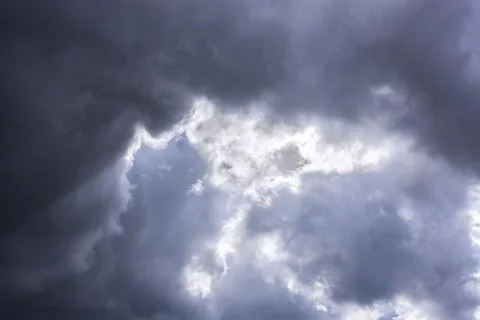 Dramatic thunderstorm clouds background at dark sky Stock Photos