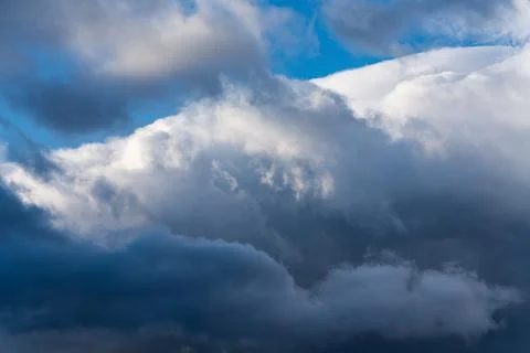 Dramatic thunderstorm clouds in blue sky before rain Stock Photos