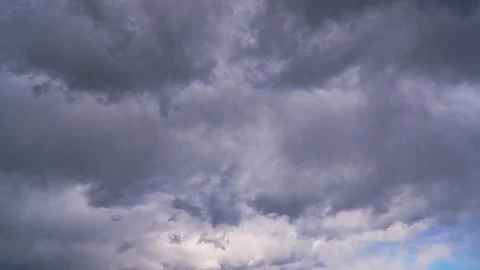Dramatic thunderstorm clouds fly fast in the sky Stock Footage 105350084