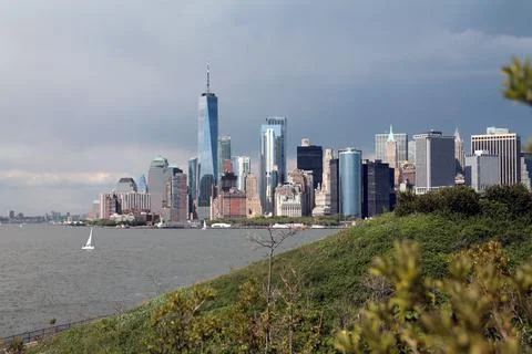 The dramatic thunderstorm sky over the skyscrapers of Manhattan from Governor Stock Photos