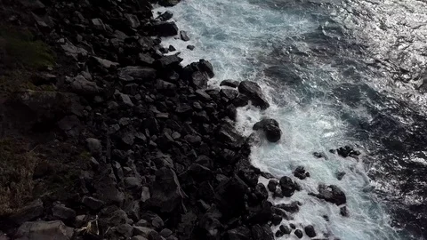 Dramatic Tilt Shot Of Black Volcanic Rock Beach Atlantic Coastline, Terceira Stock Footage 90563489