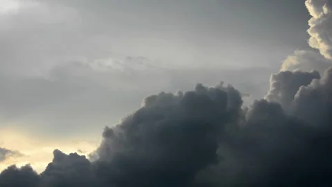 Dramatic Time-Lapse of Dark Storm Clouds and Sunlight Over Sky Stock Footage 344717066