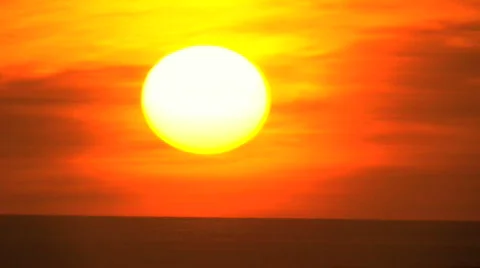 Dramatic Time-lapse of Full Sun Setting Stock Footage 629078