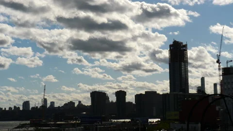 Dramatic time lapse manhattan skyline with cumulus clouds Stock Footage 136716423