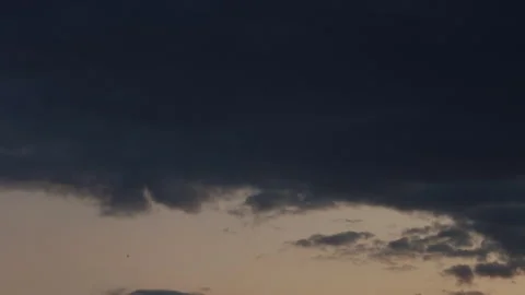 Dramatic time lapse of stormy clouds at sunset. Stock Footage 331678774