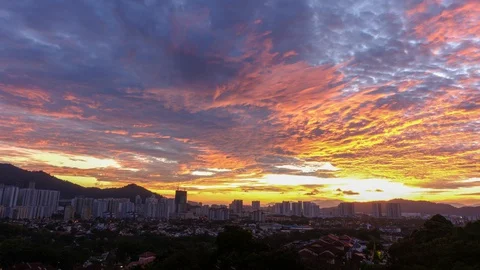 Dramatic Time-Lapse Sunrise Over Clouds At Penang, Malaysia Stock Footage 128220648