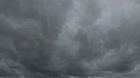 Dramatic timelapse of black clouds moving fast across the sky Stock Footage 321797786
