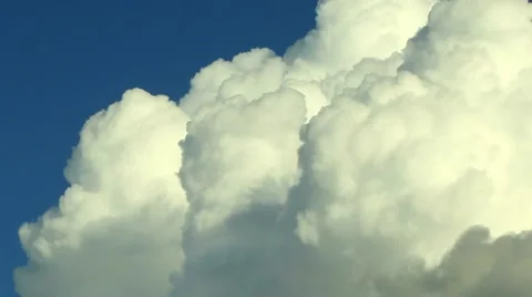 Dramatic timelapse clip of large billowing clouds during the day Stock Footage 45296293
