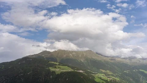 Dramatic Timelapse of Clouds and a Faint Rainbow Over Ladis, Austrian Alps Stock Footage 344288500