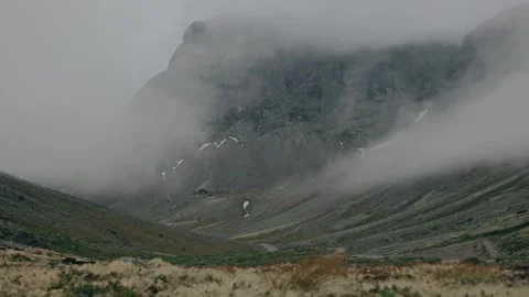Dramatic timelapse of clouds in the mountains Stock Footage 255742601