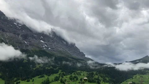 Dramatic Timelapse of Clouds Swarming Around North Face of Eiger Stock Footage 157609307