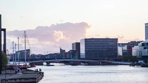 Dramatic Timelapse of Copenhagen's Skyline at Water Bridge by Sunset Clouds Stock Footage 312982002