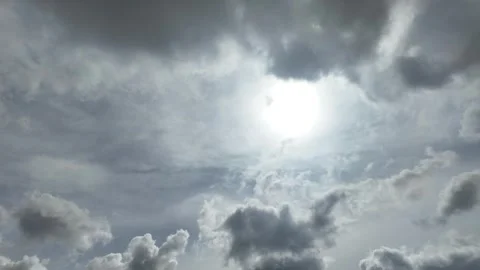 Dramatic timelapse of dark clouds obscuring sunlight Stock Footage 309087602