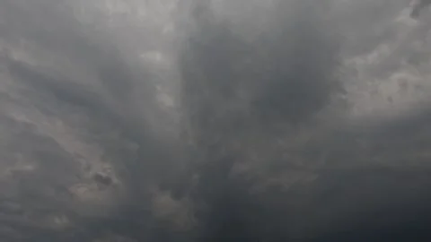 Dramatic timelapse of dark grey clouds rolling across the sky 2 Stock Footage 320103232