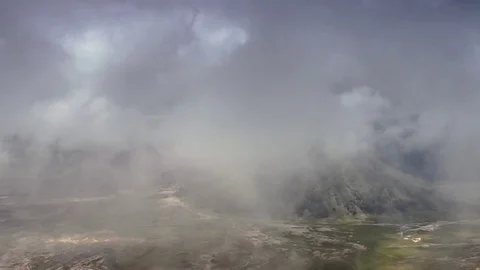 Dramatic timelapse of fast moving clouds over Bromo volcano in Java, Indonesia Stock Footage 73978857
