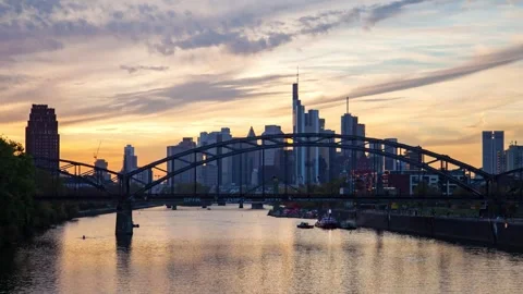 Dramatic timelapse of Frankfurt's skyline during autumn sunset with traffic Stock Footage 308164782