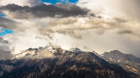 Dramatic Timelapse of Mountain Top in Rain and Sun Stock Footage 127190267