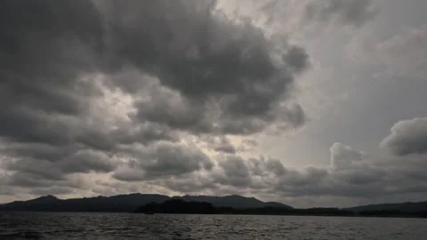 Dramatic timelapse panorama of clouds and water in a reservoir Stock-Footage 307412512